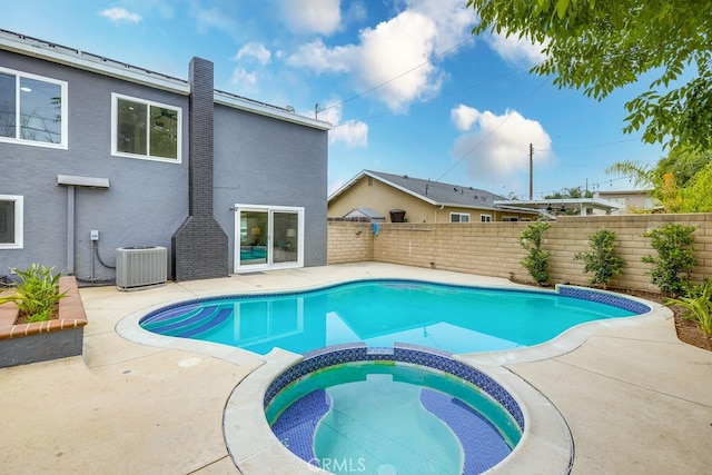 24162 Twig St, Lake Forest, CA 92630 - view of pool featuring central air condition unit, a pool with connected hot tub, a fenced backyard, and a patio