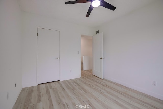 24162 Twig St, Lake Forest, CA 92630 - unfurnished bedroom featuring light wood finished floors, a ceiling fan, and baseboards