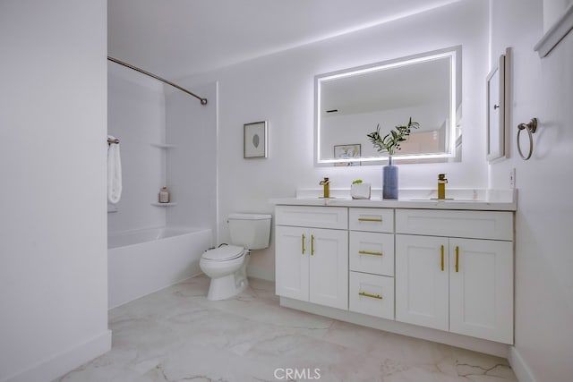 24162 Twig St, Lake Forest, CA 92630 - bathroom featuring double vanity, marble look tile flooring, toilet, and baseboards