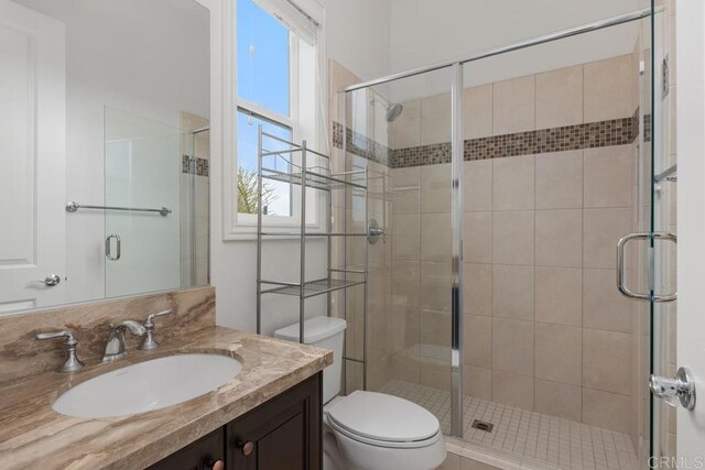 2527 Wellspring St, Carlsbad, CA 92010 - bathroom with vanity, toilet, and a shower stall