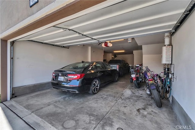 962 Newberry Ln, Claremont, CA 91711 - garage featuring a garage door opener