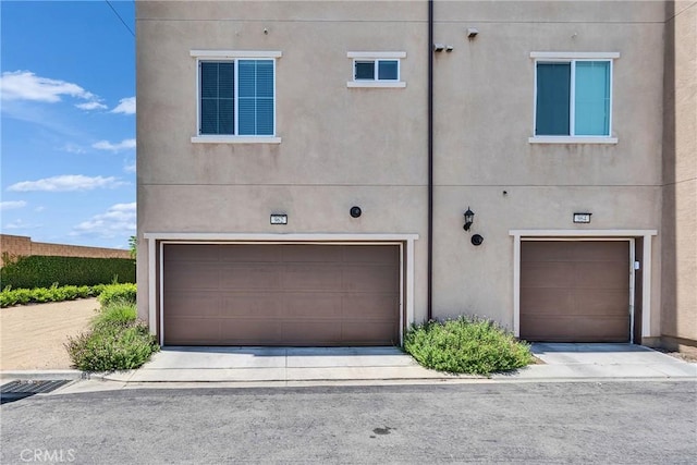 962 Newberry Ln, Claremont, CA 91711 - view of front of home featuring a garage and stucco siding