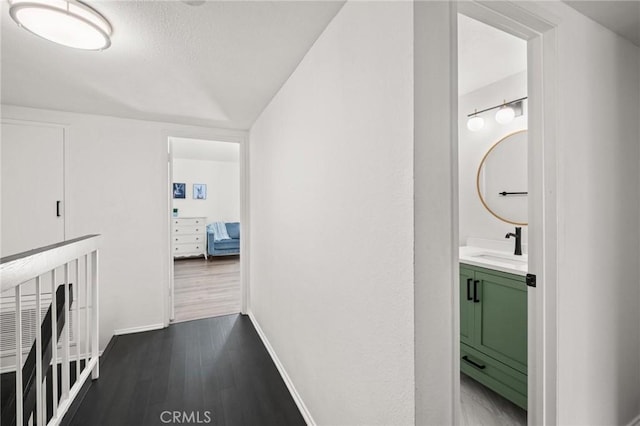 2310 Vanderbilt Ln Unit 4, Redondo Beach, CA 90278 - hallway featuring wood finished floors and a textured ceiling