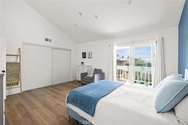 2310 Vanderbilt Ln Unit 4, Redondo Beach, CA 90278 - bedroom with wood finished floors, lofted ceiling, and a closet