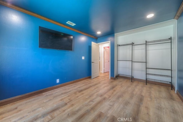 1043 Meadowview Ct, Corona, CA 92878 - unfurnished bedroom featuring recessed lighting, wood finished floors, and crown molding
