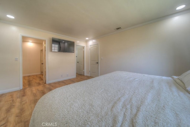 1043 Meadowview Ct, Corona, CA 92878 - bedroom with crown molding, wood finished floors, and recessed lighting