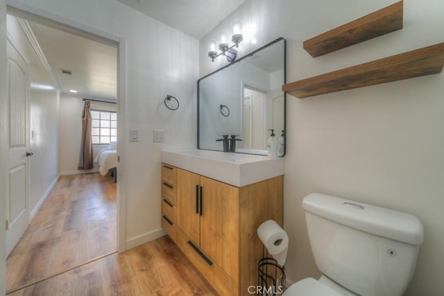 1043 Meadowview Ct, Corona, CA 92878 - ensuite bathroom featuring vanity and wood finished floors
