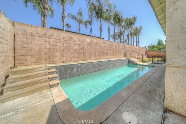1043 Meadowview Ct, Corona, CA 92878 - view of pool with a fenced backyard and a patio area