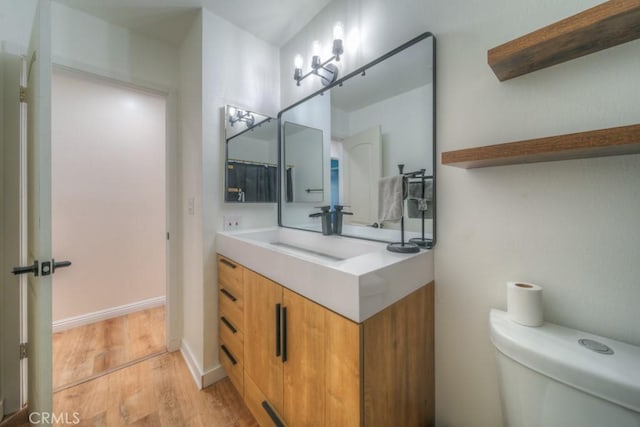 1043 Meadowview Ct, Corona, CA 92878 - bathroom featuring wood finished floors and vanity