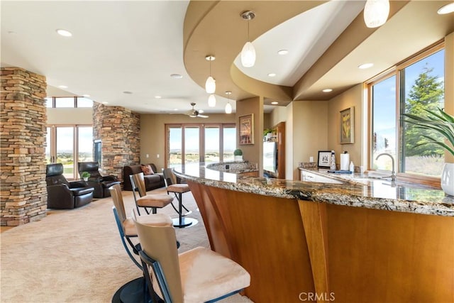2340 Battering Rock Rd, Templeton, CA 93465 - kitchen with stone countertops, light colored carpet, plenty of natural light, hanging light fixtures, and recessed lighting
