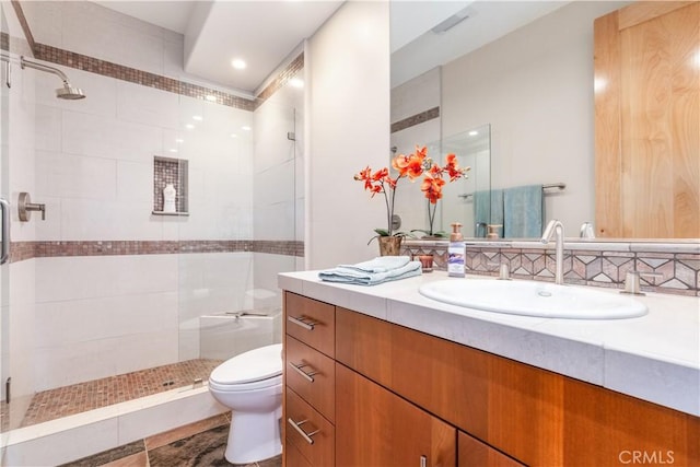 2340 Battering Rock Rd, Templeton, CA 93465 - bathroom featuring toilet, a stall shower, vanity, and recessed lighting