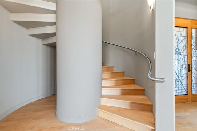 2340 Battering Rock Rd, Templeton, CA 93465 - stairs featuring healthy amount of natural light, wood finished floors, and french doors