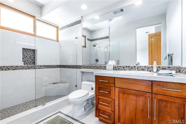 2340 Battering Rock Rd, Templeton, CA 93465 - bathroom with vanity, a stall shower, toilet, tile patterned flooring, and tasteful backsplash