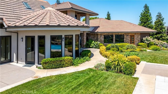 2340 Battering Rock Rd, Templeton, CA 93465 - back of house featuring a tile roof, a lawn, and stucco siding