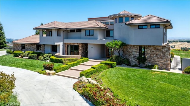 2340 Battering Rock Rd, Templeton, CA 93465 - view of front of property with stone siding, a front yard, stucco siding, and a tile roof