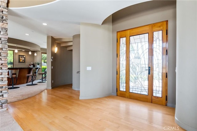 2340 Battering Rock Rd, Templeton, CA 93465 - entrance foyer with arched walkways, wood finished floors, baseboards, and recessed lighting