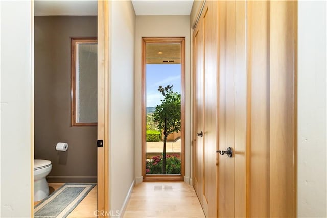 2340 Battering Rock Rd, Templeton, CA 93465 - doorway with baseboards and light wood finished floors