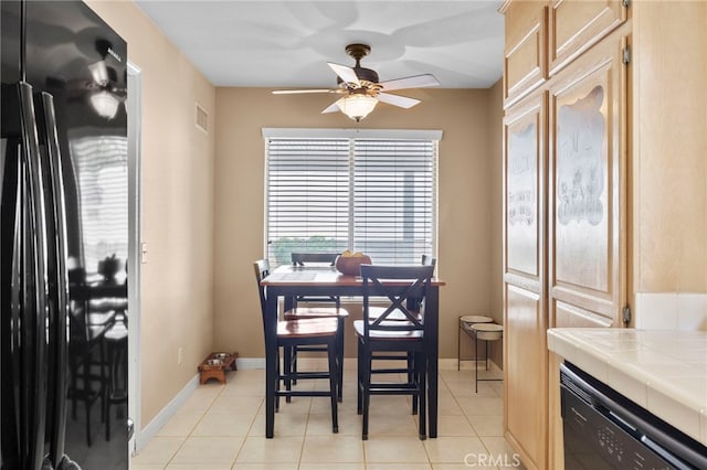 999 Alleghany Cir, San Dimas, CA 91773 - dining space featuring a ceiling fan, light tile patterned floors, and baseboards