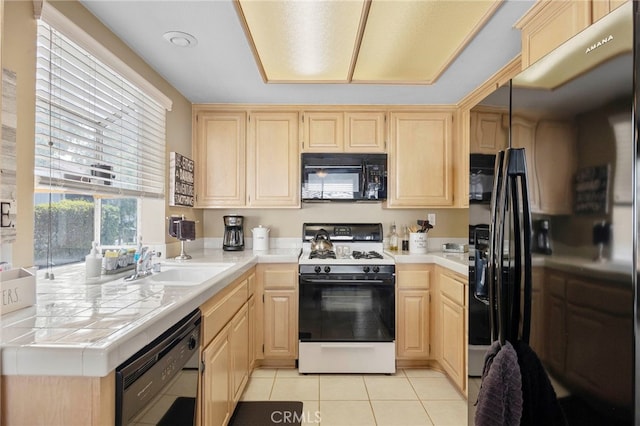 999 Alleghany Cir, San Dimas, CA 91773 - kitchen featuring black appliances, light brown cabinets, tile counters, and light tile patterned floors