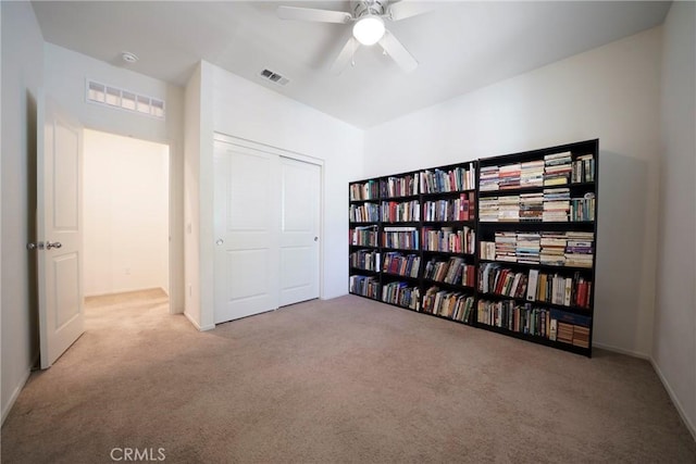 1172 Poinsettia Cir, Calimesa, CA 92320 - unfurnished bedroom featuring carpet flooring, a closet, and ceiling fan