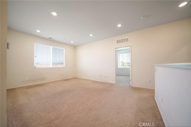 1172 Poinsettia Cir, Calimesa, CA 92320 - spare room featuring light carpet and recessed lighting