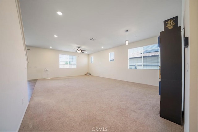 1172 Poinsettia Cir, Calimesa, CA 92320 - empty room with carpet flooring, a ceiling fan, and recessed lighting
