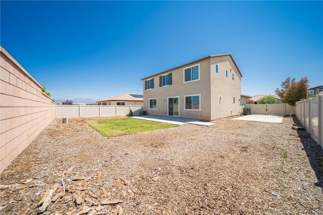 1172 Poinsettia Cir, Calimesa, CA 92320 - rear view of house featuring a patio area, a fenced backyard, and stucco siding