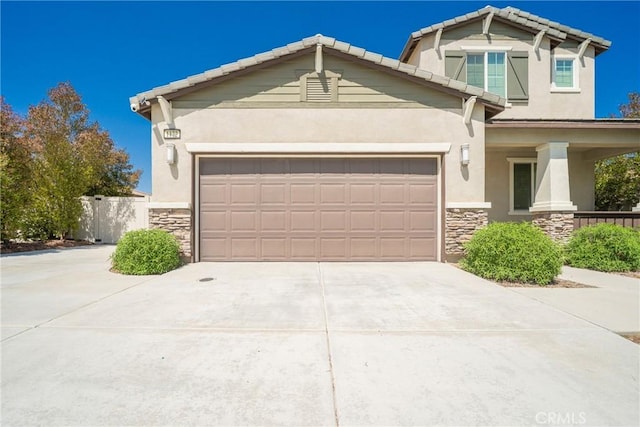 1172 Poinsettia Cir, Calimesa, CA 92320 - craftsman-style house with stone siding, concrete driveway, an attached garage, and stucco siding