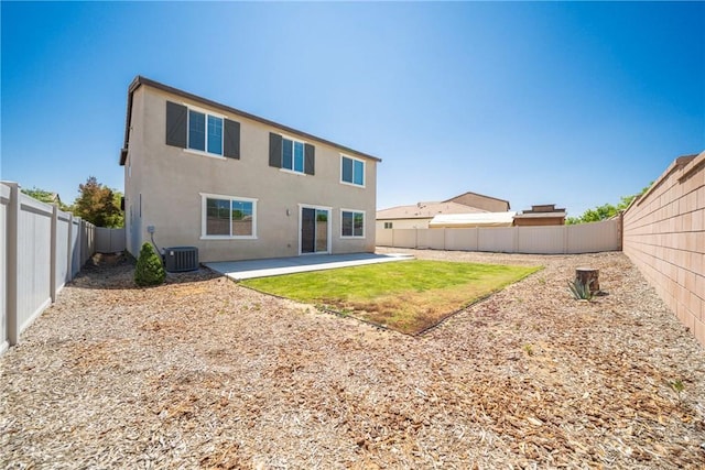 1172 Poinsettia Cir, Calimesa, CA 92320 - back of house featuring a fenced backyard, stucco siding, and a patio