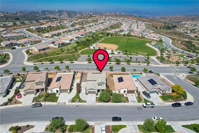 1172 Poinsettia Cir, Calimesa, CA 92320 - aerial view of property's location featuring nearby suburban area and a mountain backdrop