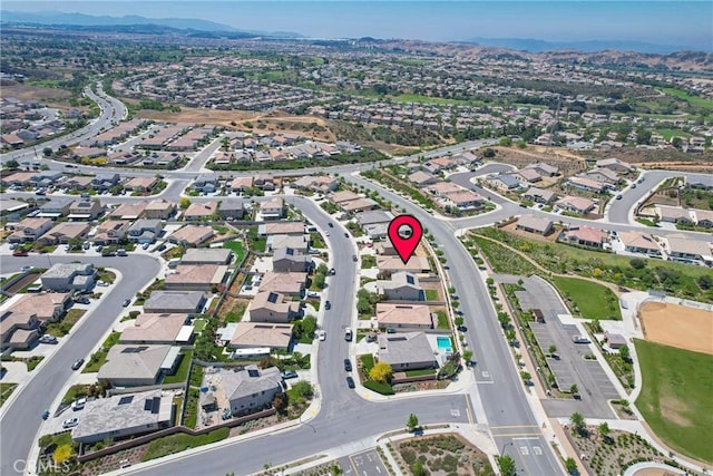 1172 Poinsettia Cir, Calimesa, CA 92320 - aerial view of property and surrounding area featuring a mountainous background and nearby suburban area