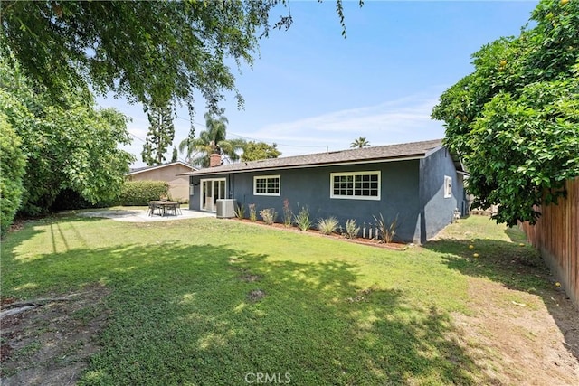 2225 Cartlen Dr, Placentia, CA 92870 - back of property with stucco siding, central AC, and a patio area