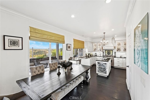 24 Lyon Rdg, Aliso Viejo, CA 92656 - dining room featuring a chandelier, dark wood-style floors, ornamental molding, and recessed lighting