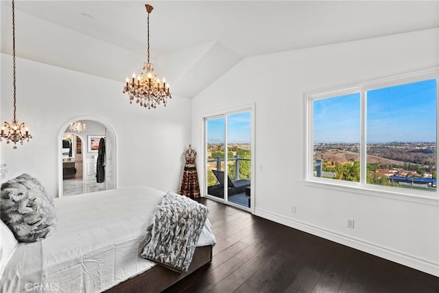 24 Lyon Rdg, Aliso Viejo, CA 92656 - bedroom featuring a chandelier, access to exterior, vaulted ceiling, dark wood-type flooring, and arched walkways
