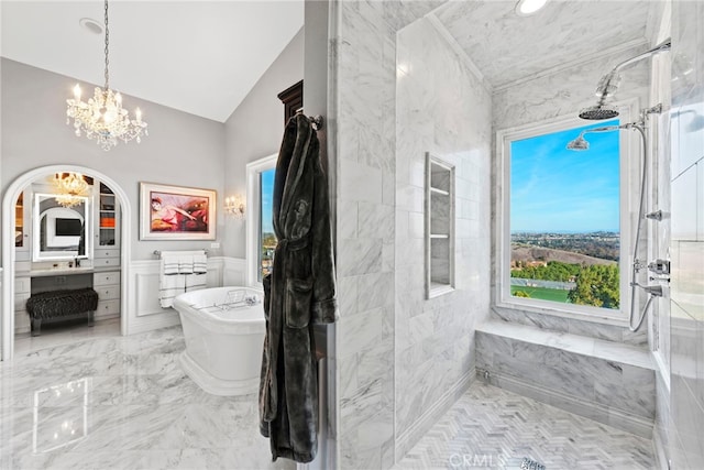 24 Lyon Rdg, Aliso Viejo, CA 92656 - full bathroom with vaulted ceiling, a chandelier, vanity, a soaking tub, and a shower