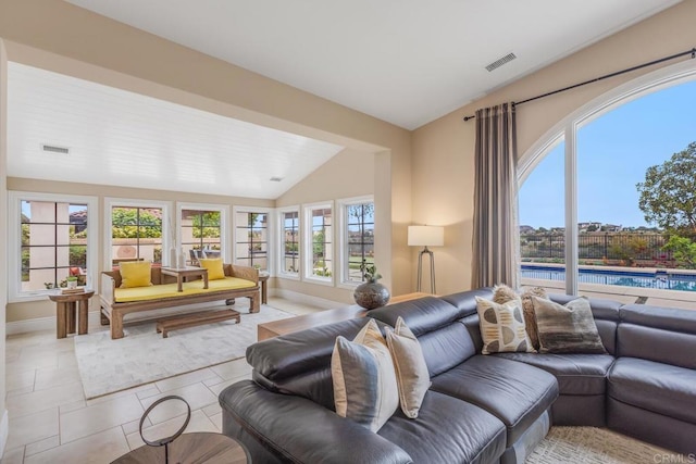 6286 Belmont Trail Ct, San Diego, CA 92130 - living room with lofted ceiling, light tile patterned floors, and baseboards