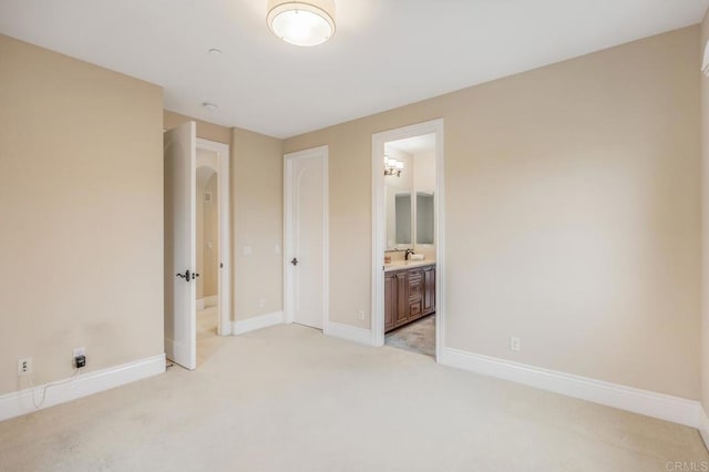6286 Belmont Trail Ct, San Diego, CA 92130 - unfurnished bedroom featuring light colored carpet, baseboards, and connected bathroom