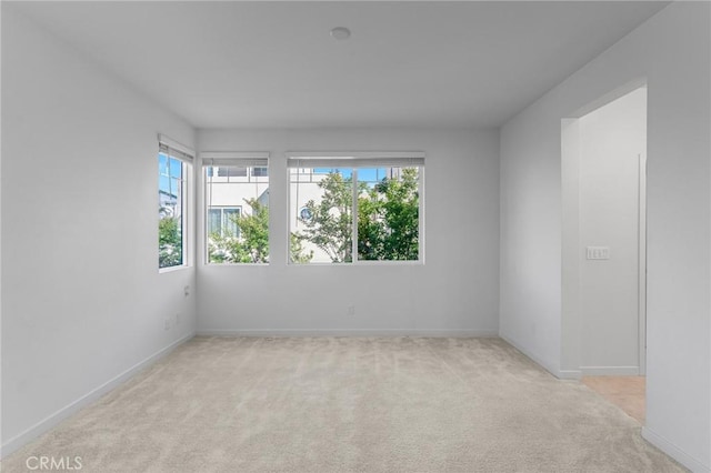 148 Stage, Irvine, CA 92618 - carpeted empty room with healthy amount of natural light and baseboards