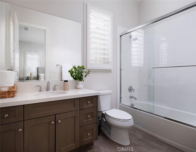 112 Mountain Sky, Irvine, CA 92602 - bathroom with vanity, enclosed tub / shower combo, and wood finished floors