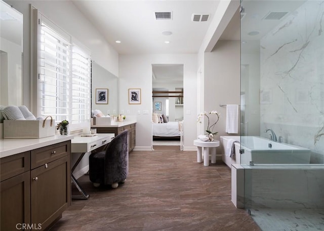 112 Mountain Sky, Irvine, CA 92602 - bathroom with a soaking tub, healthy amount of natural light, connected bathroom, vanity, and recessed lighting