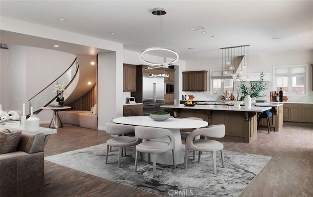 112 Mountain Sky, Irvine, CA 92602 - dining room with stairs, recessed lighting, and light wood-style flooring