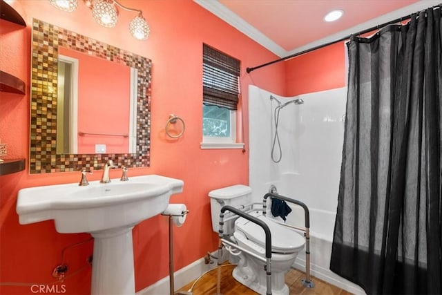 10586 Ring Ave, Rancho Cucamonga, CA 91737 - full bath featuring shower / bath combination with curtain, crown molding, and wood finished floors