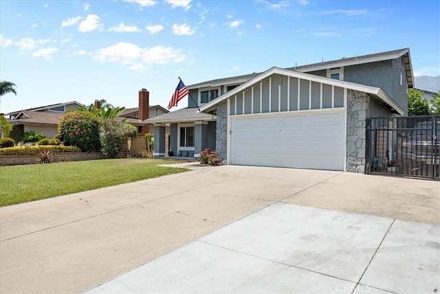10586 Ring Ave, Rancho Cucamonga, CA 91737 - view of front facade with stone siding, driveway, a garage, and board and batten siding