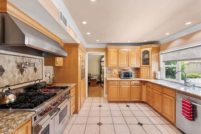 10586 Ring Ave, Rancho Cucamonga, CA 91737 - kitchen featuring appliances with stainless steel finishes, wall chimney exhaust hood, backsplash, ornamental molding, and glass insert cabinets