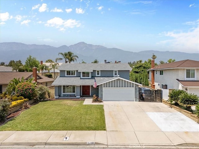 10586 Ring Ave, Rancho Cucamonga, CA 91737 - traditional home with driveway, a mountain view, a garage, stone siding, and a gate