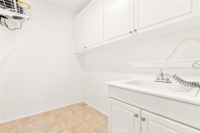 8180 E Brookdale Ln, Anaheim Hills, CA 92807 - laundry room featuring a sink, baseboards, and light tile patterned floors