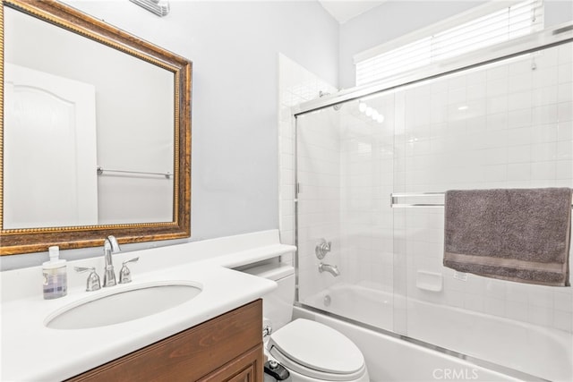 8180 E Brookdale Ln, Anaheim Hills, CA 92807 - bathroom with vanity, shower / bath combination with glass door, and toilet