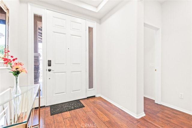 8180 E Brookdale Ln, Anaheim Hills, CA 92807 - foyer entrance featuring dark wood-style flooring and baseboards