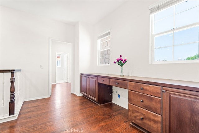8180 E Brookdale Ln, Anaheim Hills, CA 92807 - unfurnished office featuring dark wood-style floors, plenty of natural light, and baseboards