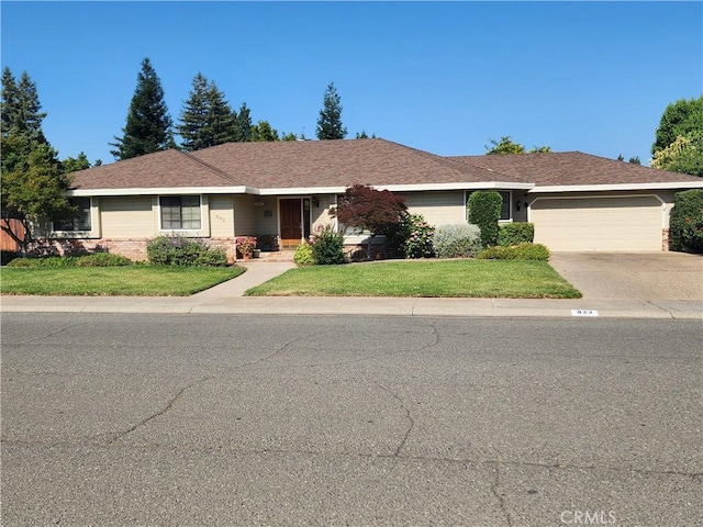 833 Saint Amant Dr, Chico, CA 95926 - single story home featuring an attached garage, a front lawn, and driveway